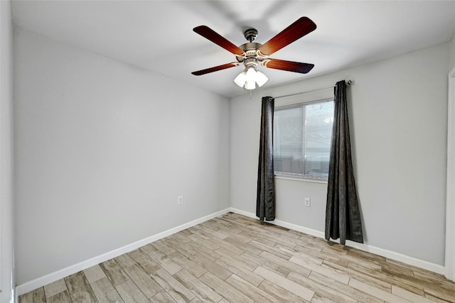7405 Cayenne Ln, Austin, TX 78741 - unfurnished room with light wood-style flooring, baseboards, and a ceiling fan