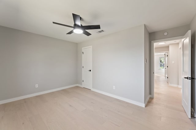 unfurnished bedroom with light hardwood / wood-style floors and ceiling fan