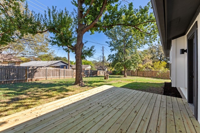 deck featuring a yard