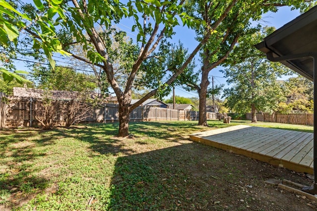 view of yard with a deck