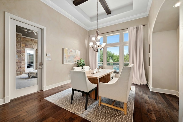 dining space featuring ornamental molding, dark hardwood / wood-style floors, and a chandelier