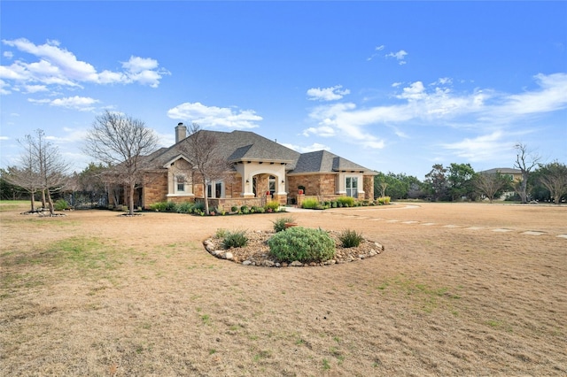 view of front of property with a front yard