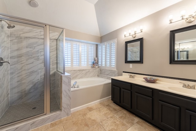 bathroom with plus walk in shower, lofted ceiling, and vanity