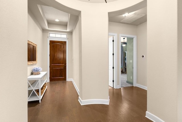 hall with dark wood-type flooring