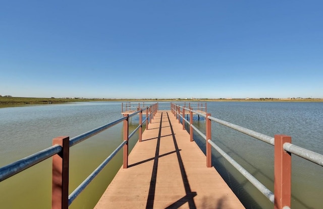 view of dock with a water view