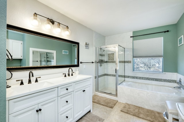 bathroom with tile patterned flooring, vanity, and separate shower and tub