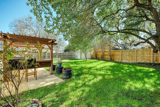 view of yard with a pergola and a patio