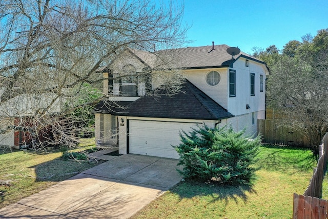 view of side of property featuring a garage and a yard