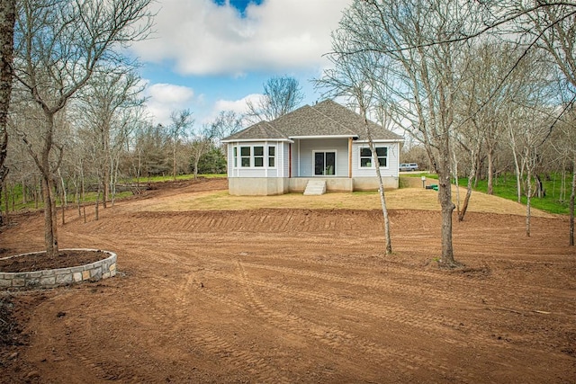 exterior space with a yard