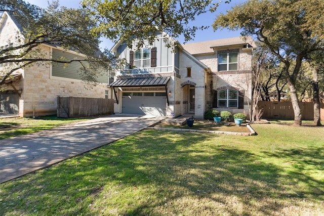 view of front of home with a garage and a front lawn