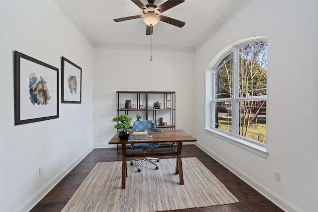 office space featuring dark wood-type flooring, ornamental molding, and ceiling fan