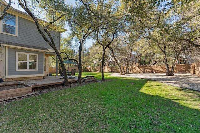 view of yard with a deck