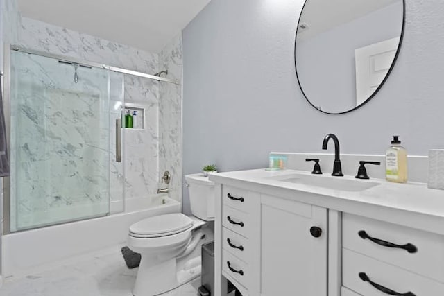 full bathroom featuring enclosed tub / shower combo, vanity, and toilet