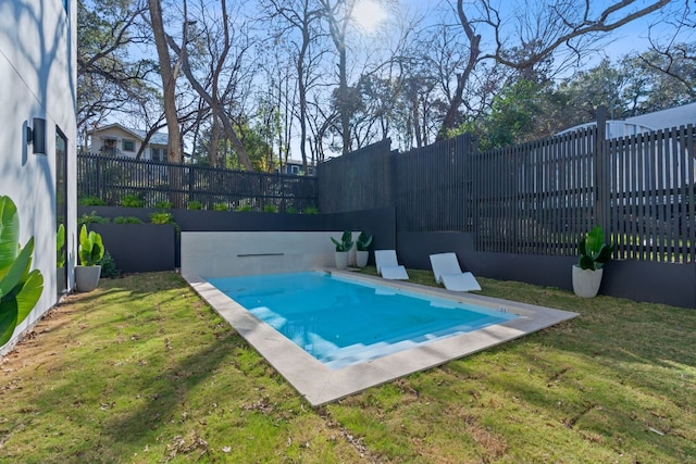 view of pool featuring a yard