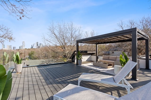 wooden terrace with outdoor lounge area