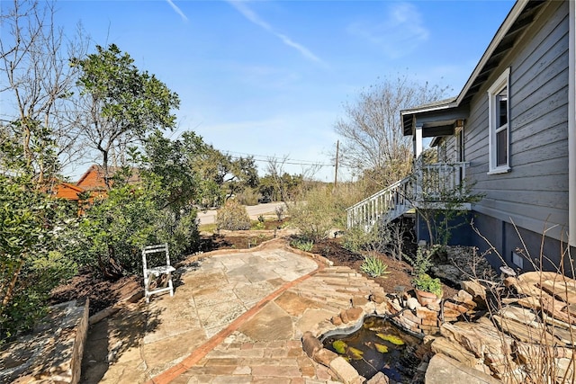 2201 Indian Creek Rd, Austin, TX 78734 - view of yard featuring a patio area and stairway