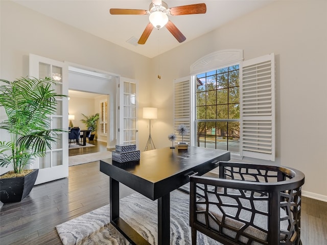 office area featuring dark wood-type flooring, ceiling fan, and french doors