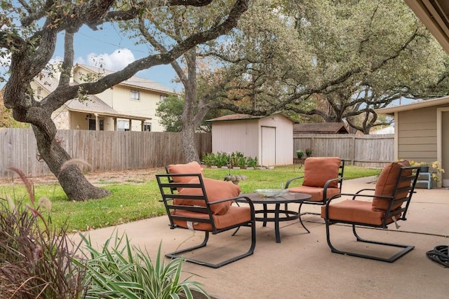 view of patio / terrace featuring a shed