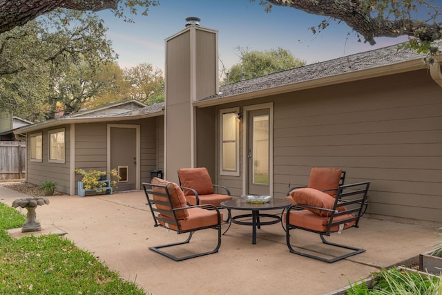 back of property with a patio area