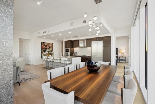 dining area featuring light hardwood / wood-style floors