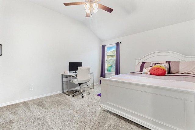 bedroom featuring vaulted ceiling, light colored carpet, and ceiling fan