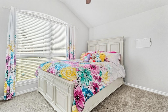 carpeted bedroom with lofted ceiling and ceiling fan