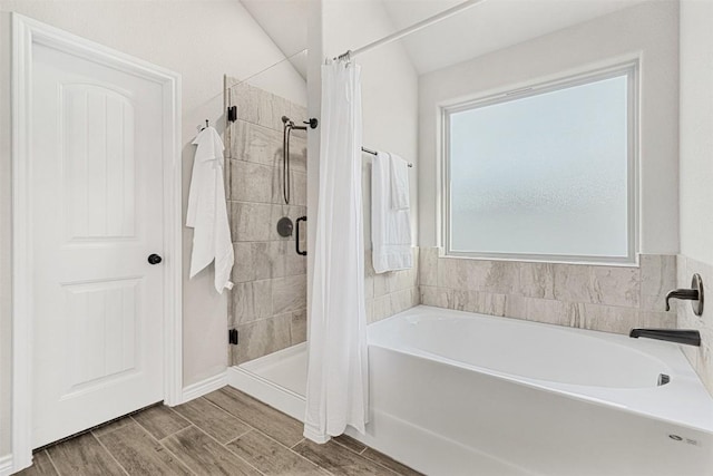 2651 Cowgirl Trl, Belton, TX 76513 - bathroom with a bath, a stall shower, and wood finished floors