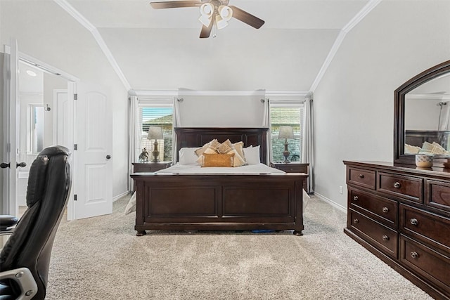 bedroom with crown molding, light colored carpet, lofted ceiling, and multiple windows