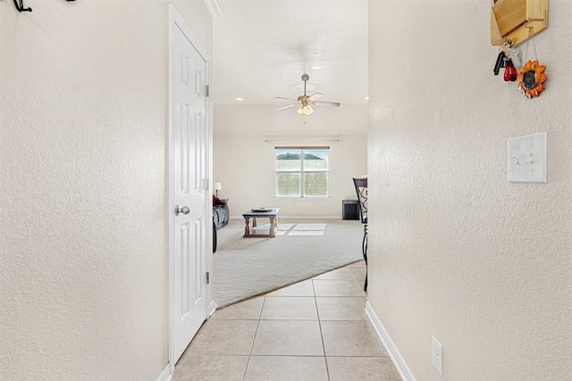 hallway with light tile patterned flooring