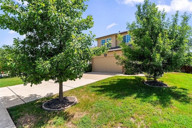 obstructed view of property featuring driveway, a garage, and a front lawn