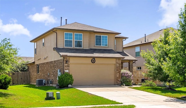 view of front of home featuring a garage, central AC, and a front yard