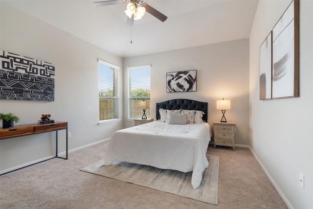 bedroom with baseboards, carpet flooring, and a ceiling fan