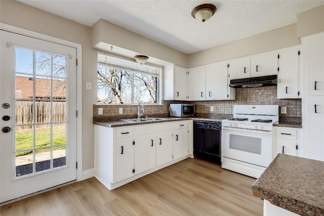 kitchen featuring white cabinetry, dishwasher, white range with gas cooktop, and sink