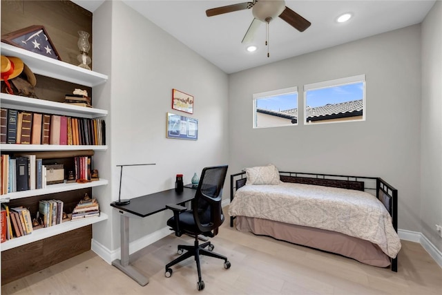 bedroom featuring ceiling fan and wood-type flooring