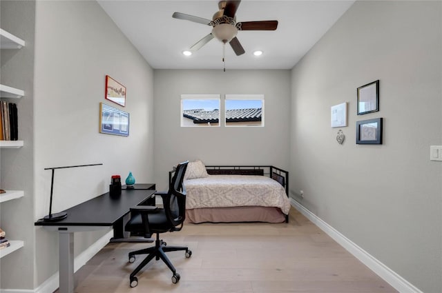 bedroom featuring ceiling fan and light hardwood / wood-style floors