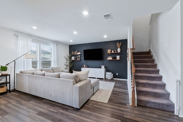 living room with recessed lighting, visible vents, baseboards, stairway, and dark wood-style floors