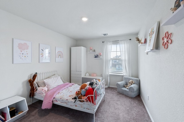 bedroom featuring carpet flooring, visible vents, and baseboards