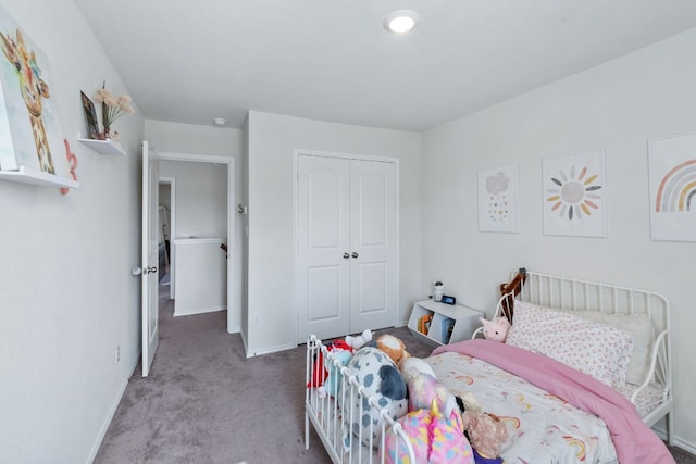 bedroom featuring a closet, carpet, and baseboards