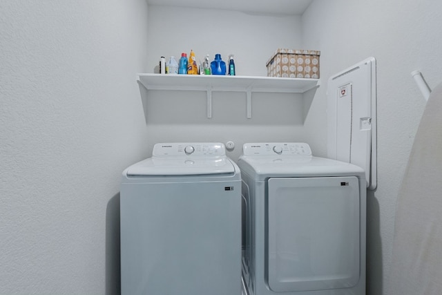 laundry area featuring laundry area and independent washer and dryer