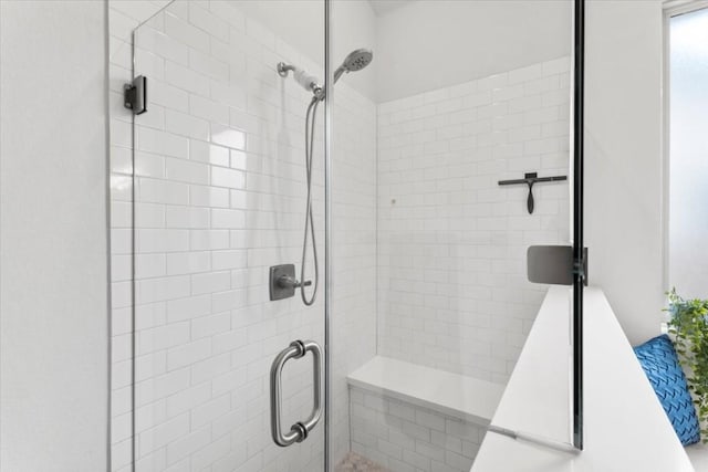 bathroom featuring an enclosed shower