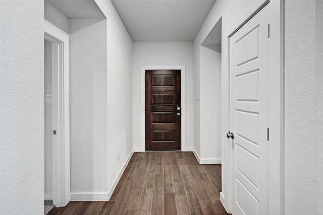 interior space with dark wood-type flooring