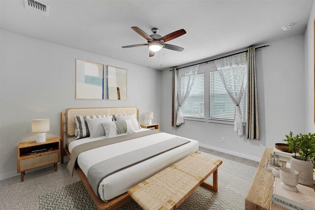 205 Ashby Dr, Hutto, TX 78634 - bedroom featuring baseboards, carpet flooring, and a ceiling fan