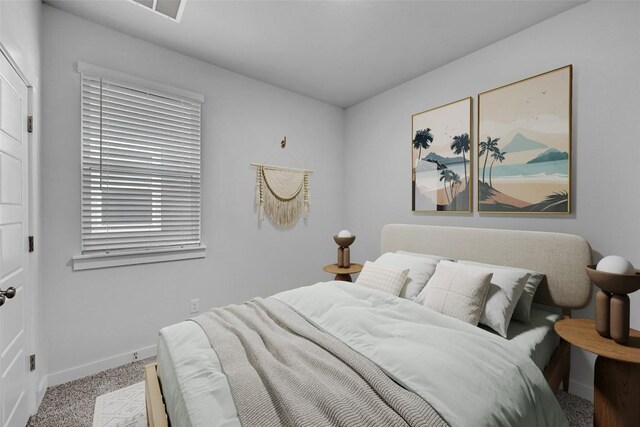 205 Ashby Dr, Hutto, TX 78634 - carpeted bedroom featuring baseboards