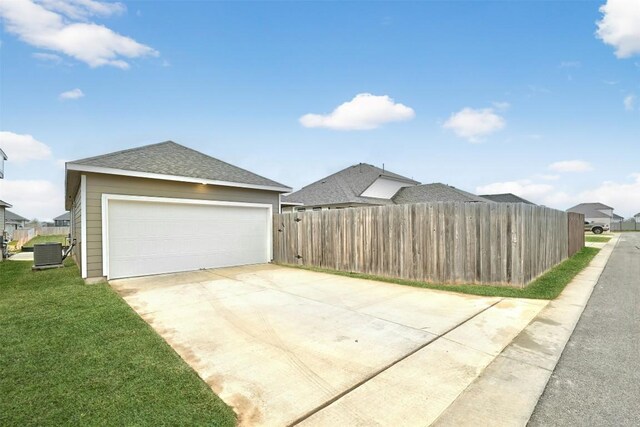 205 Ashby Dr, Hutto, TX 78634 - garage featuring central air condition unit