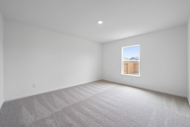 view of carpeted spare room