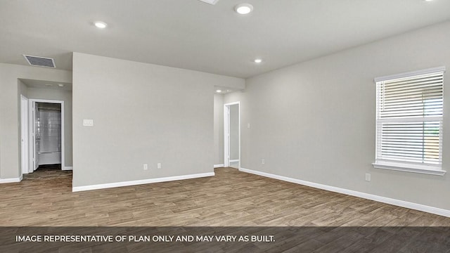 empty room featuring hardwood / wood-style floors