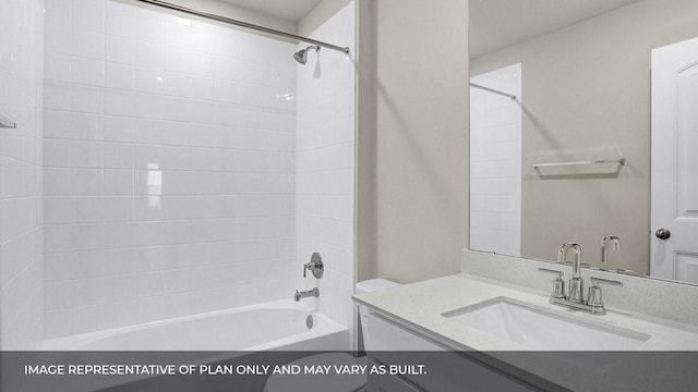 bathroom featuring vanity and tiled shower / bath combo