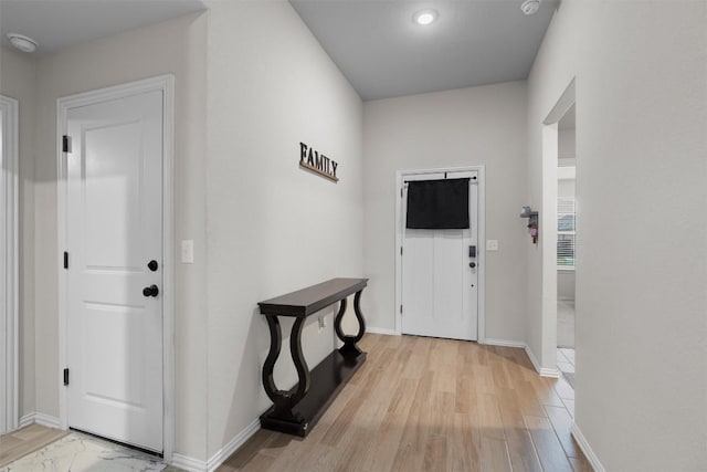 foyer entrance featuring light hardwood / wood-style floors