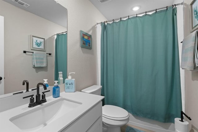 full bathroom featuring vanity, toilet, and shower / bath combo