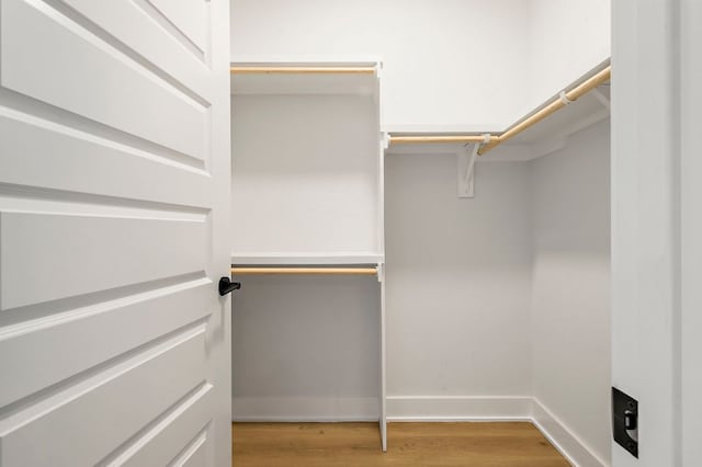 3101 Govalle Ave Unit 106, Austin, TX 78702 - walk in closet featuring light wood-style flooring